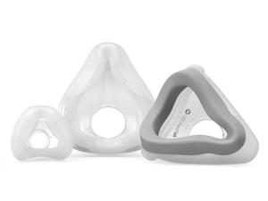 Três tipos diferentes de almofadas de máscara CPAP ResMed contra um fundo branco