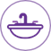 Um ícone circular roxo com um desenho de linha de um lavatório e uma torneira no interior para representar um lava-loiça.